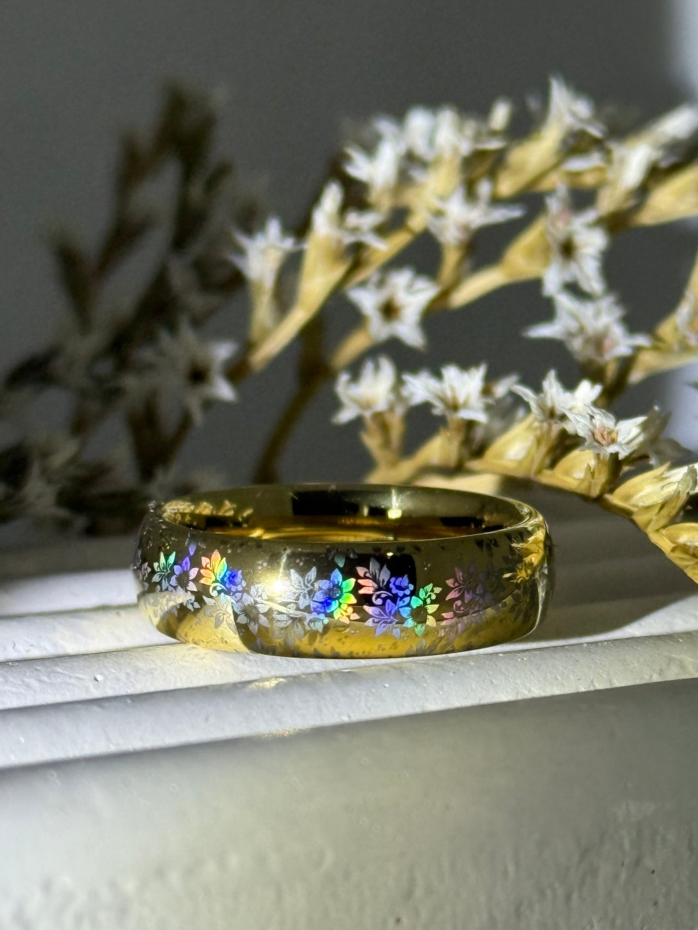 HoloRing with a laser-made holographic floral pattern