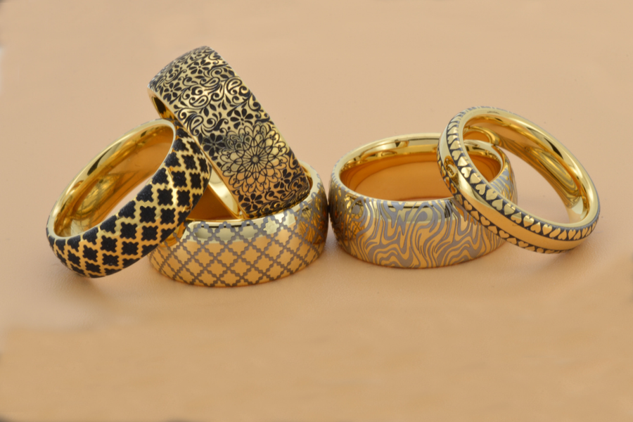 Six gold-tone HoloRing rings with different engraved patterns