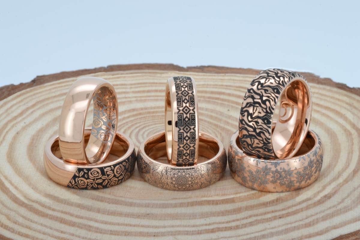 Rose gold-tone HoloRing with an engraved rose design