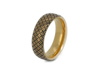 The Vintage Chic tungsten ring with laser-engraved surface detail, shown against a light background.