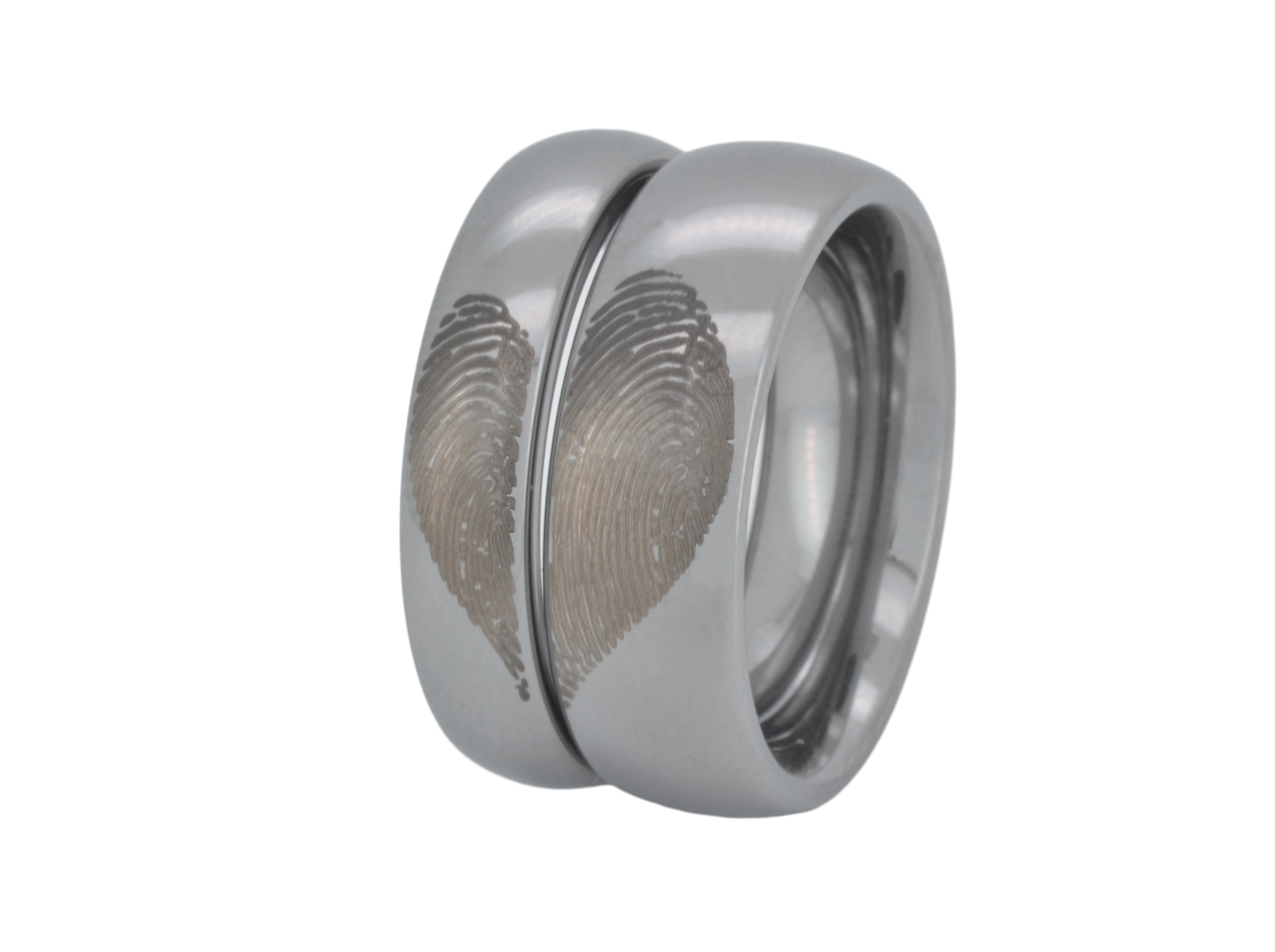 Two silver wedding bands interlocked, each featuring a unique, real fingerprint engraving, isolated on a white background.