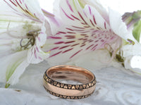 Product photo of the Eternal Love Band with laser-engraved surface detail.
