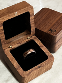 Product photo of the Eternal Love Band with laser-engraved surface detail.