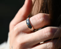 Product photo of the Tribal Pixel Mirage tungsten ring with a laser-created holographic surface effect.
