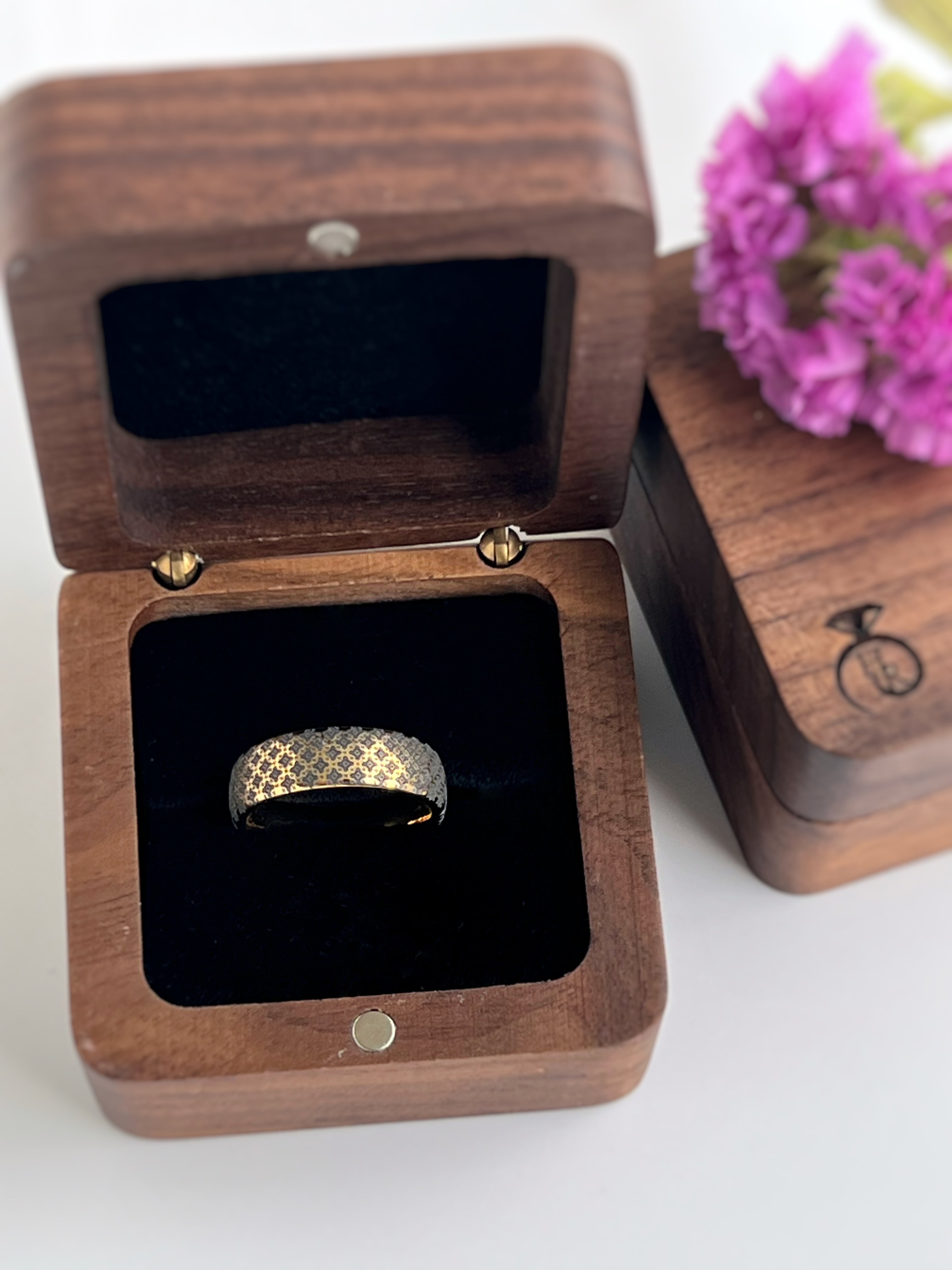 Highly polished Yellow gold tungsten ring with unique elegant black engraving of cross or star like ornamental engraving, elegant geometric pattern, premium high detail pattern. An ideal elegant gift for travellers and adventurers. Premium anniversary wedding band for special occasion or engagement. Luxury promise ring for friend, girlfriend, mother, mom or granny. Ideal original personalized present for her and him