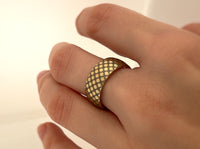 Astral Glow tungsten ring with laser-engraved surface detail, worn on a hand.