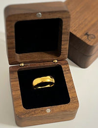 Product photo of the High Polished Yellow Gold Tungsten Wedding Band with a polished plain surface.