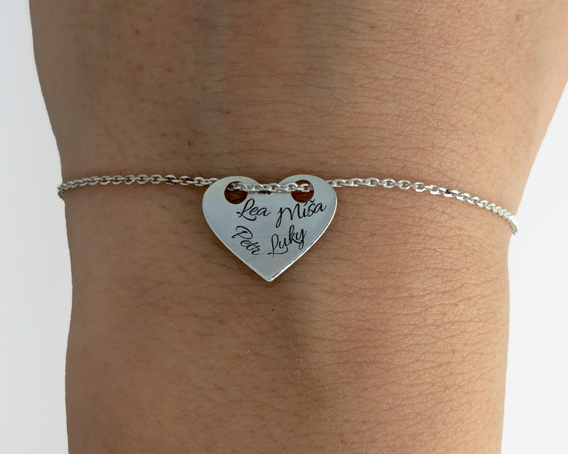 Personalized silver bracelet with engraved family names