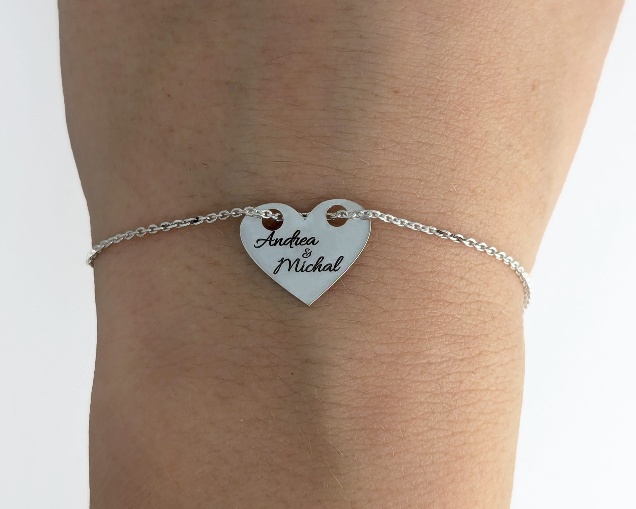 Personalized silver bracelet with engraved family names