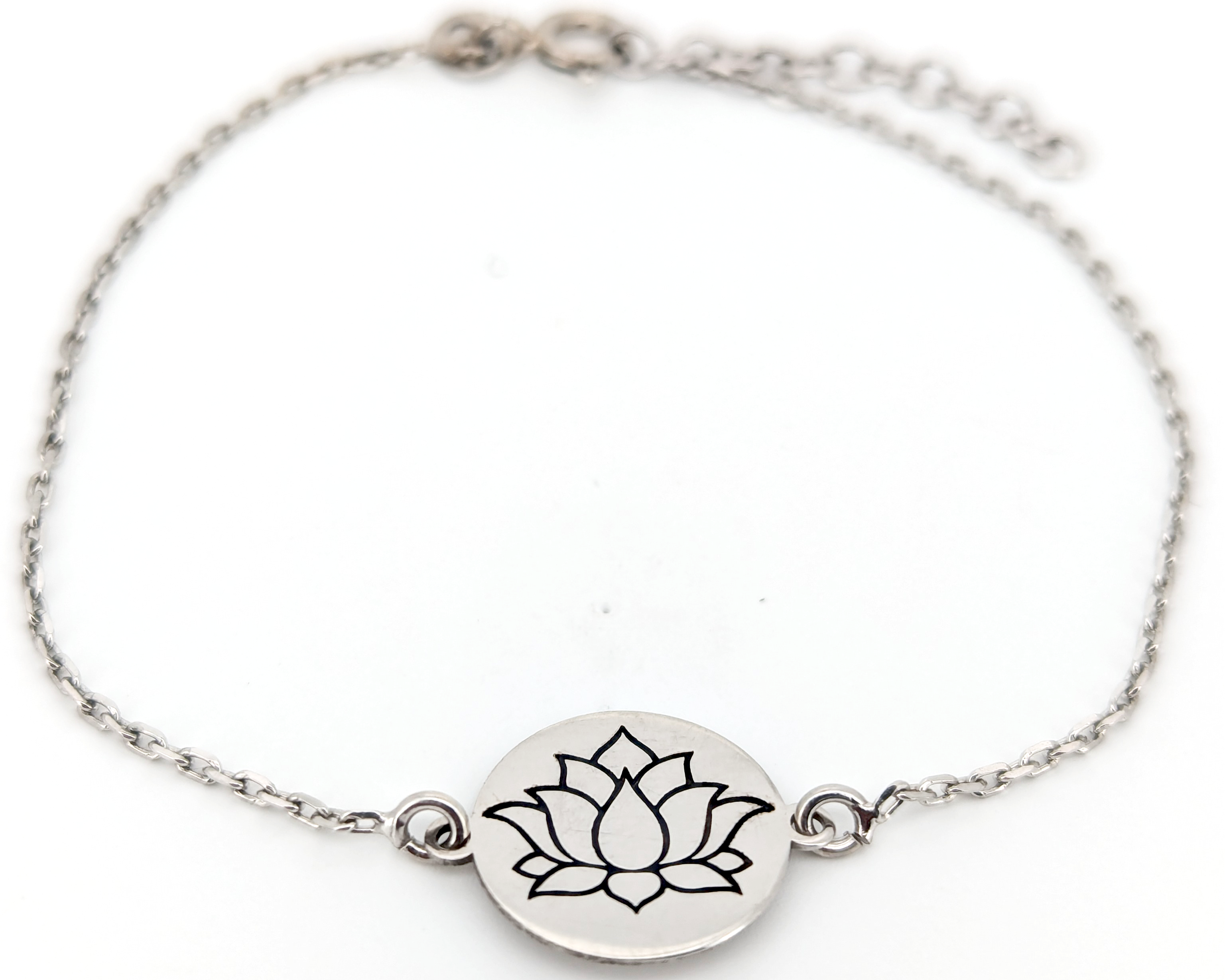 Personalized silver bracelet with engraved lotus symbol