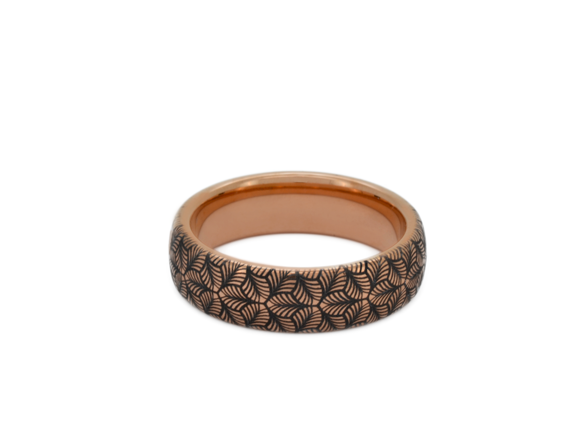 Rose gold tungsten ring with an intricate, black-engraved petal-like pattern, on a white background offering a delicate and refined look, perfect for weddings, special occasions, or everyday wear.