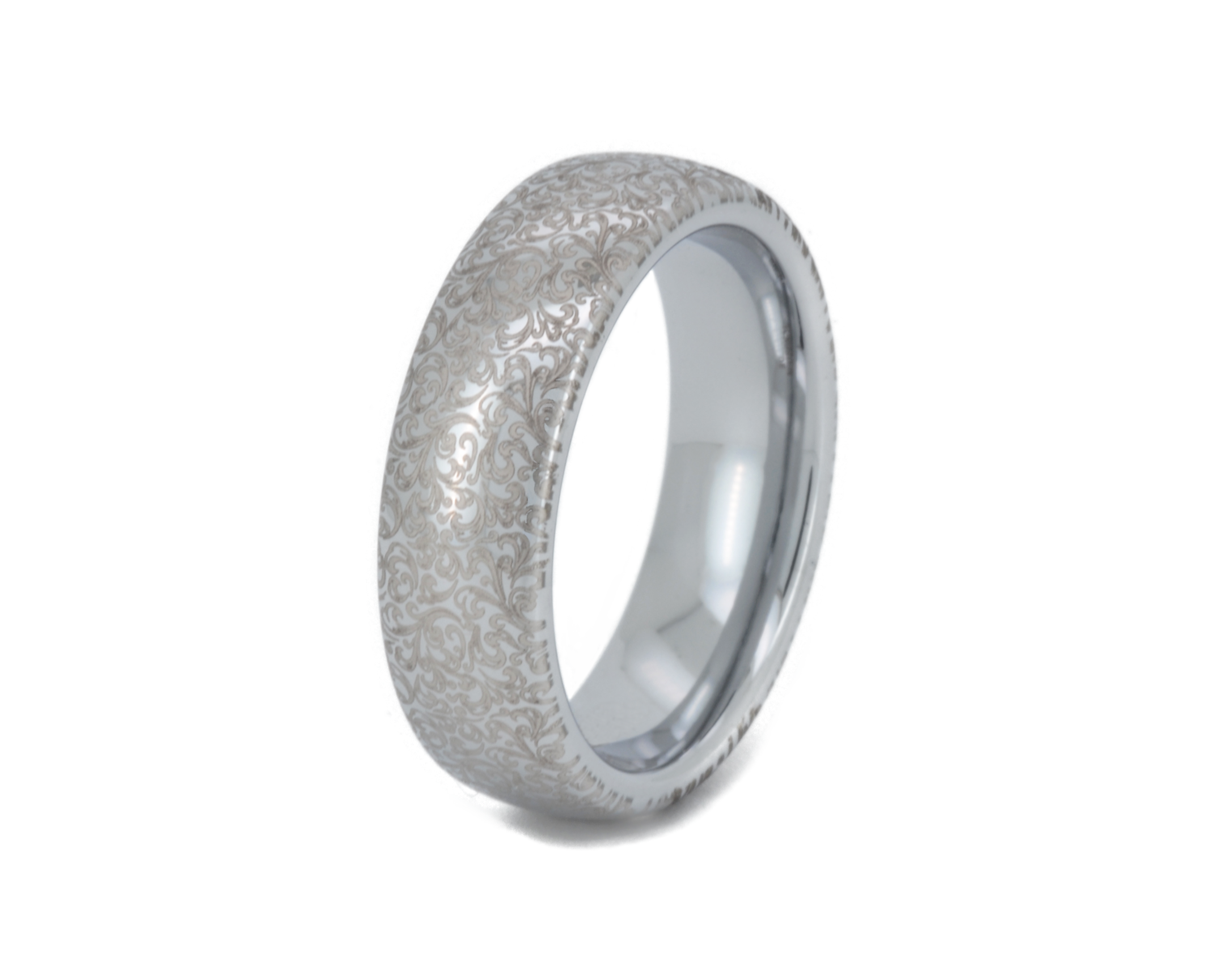 Silver ring with textured surface on a white background
