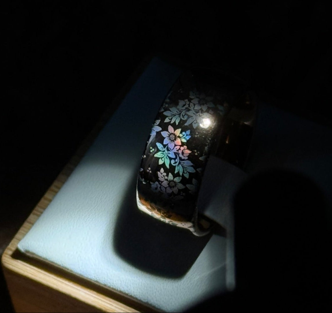 HoloRing featuring a laser-created holographic floral pattern