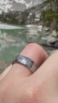 Video preview of the Mountains tungsten ring showing the surface detail as the item moves.